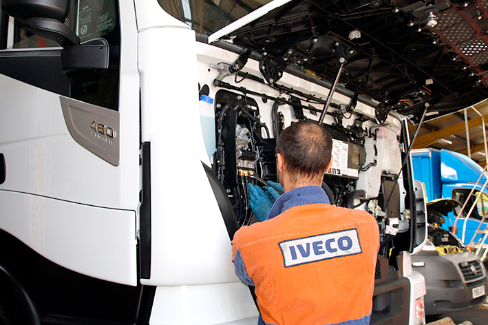 Vehicle technician working on an Iveco truck